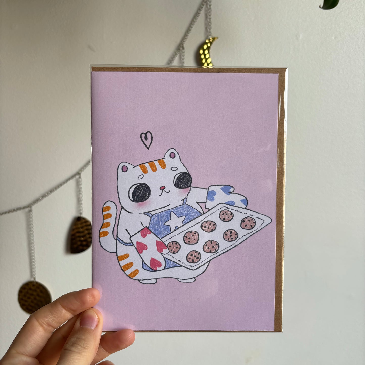 Baking cat greeting card