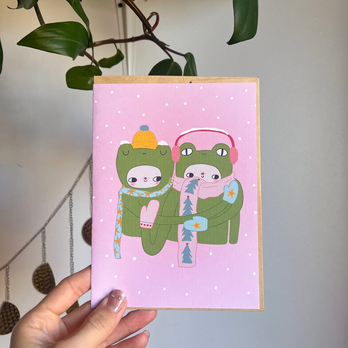 Winter frogs greeting card